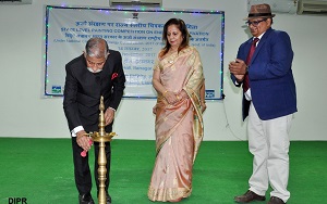 The Governor of Arunachal Pradesh Brig. (Dr.) B.D. Mishra (Retd) and the First Lady of the State Smti. Neelam Mishra  lighting the state level  painting competition on Energy Conservation organised by NHPC to promote energy conservation and prevent energy misuse at State Banquet Hall, Itanagar on 14th November2017.